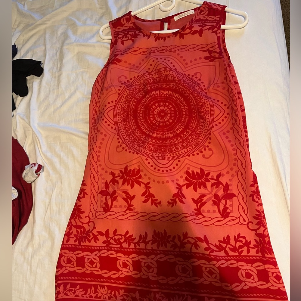 Pink/red mini dress. Size S and no stretch in fabric. Silky feel.